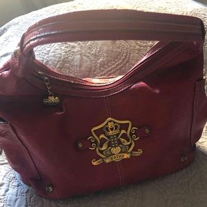 Kathy van zeeland red purse, few sings of wear